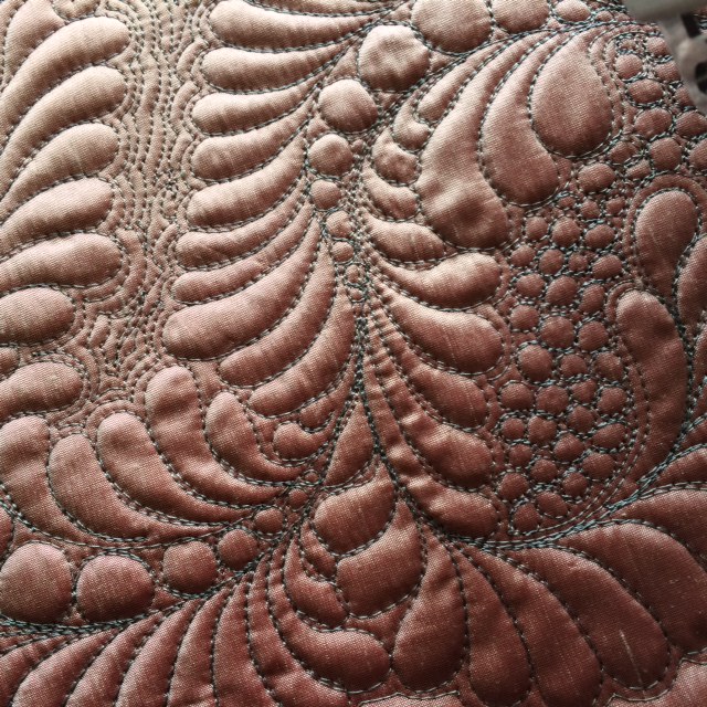 Detail of feather quilting
