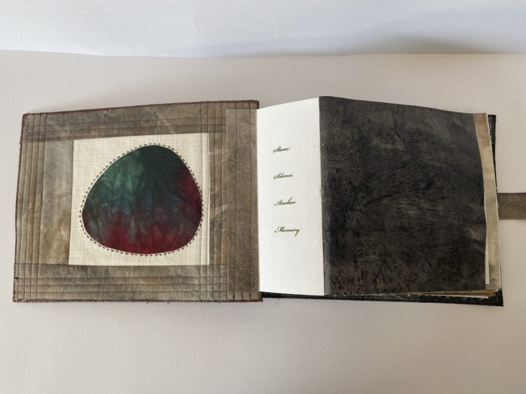 an image showing the front cover of the book and the first signature page with a small poem in the spine