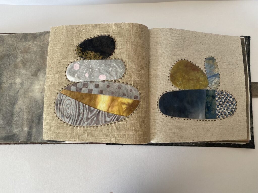 two blocks shown sewn on linen fabric with 3 rocks each