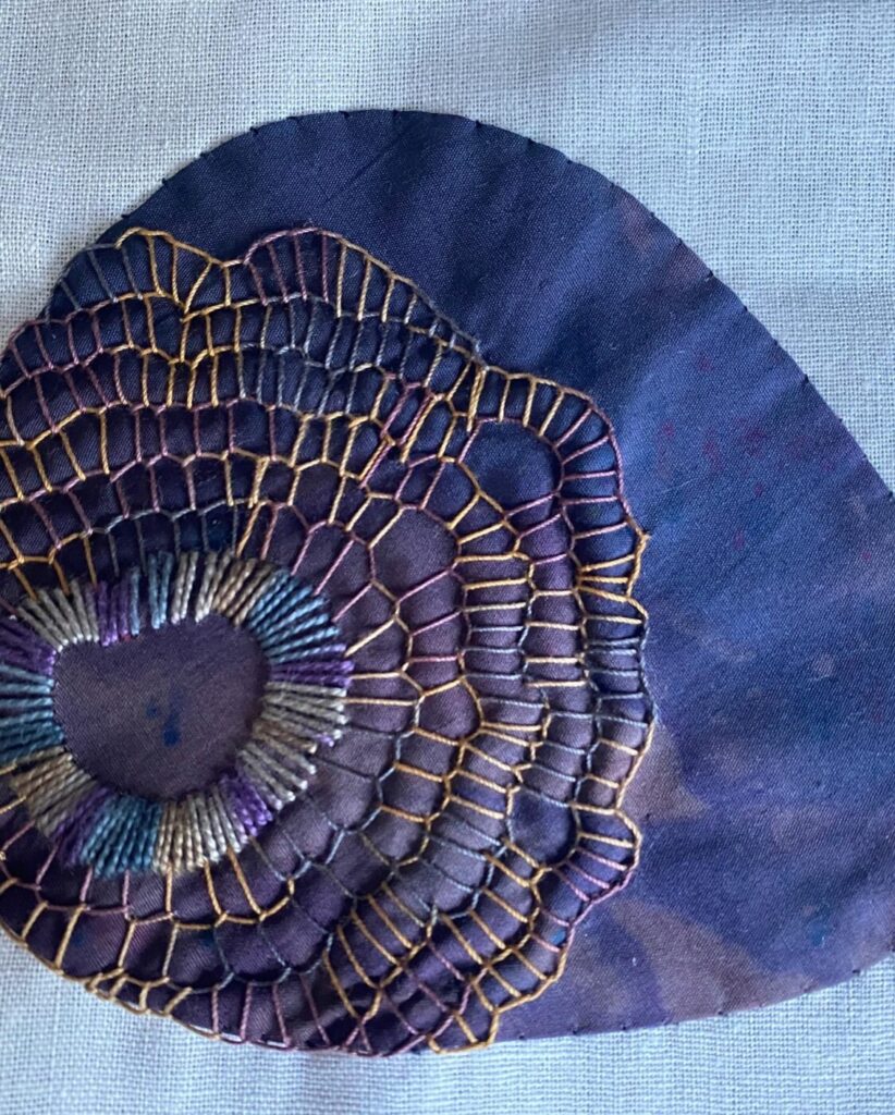 embellished rocks dark blue/black rock with blanket stitch