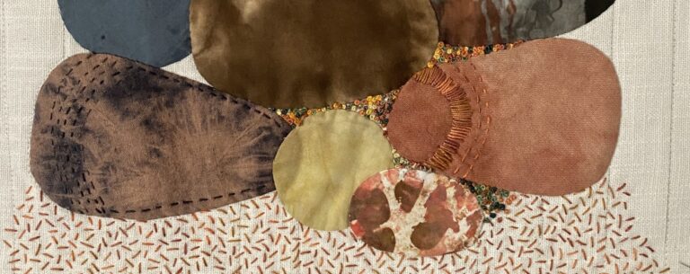 detail of the rocks for the cascade book with colonial knots, seed stitches