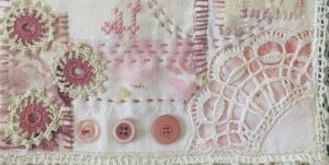 all about pink - detail from front cover bottom showing the lace from the corner of the napkin