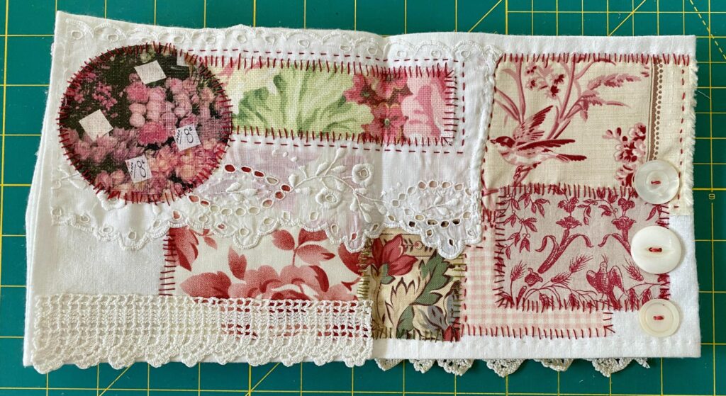 an image showing a double spread page from the Provençal book with toile de jouy, vintage fabrics, image transfer, buttons and some lace