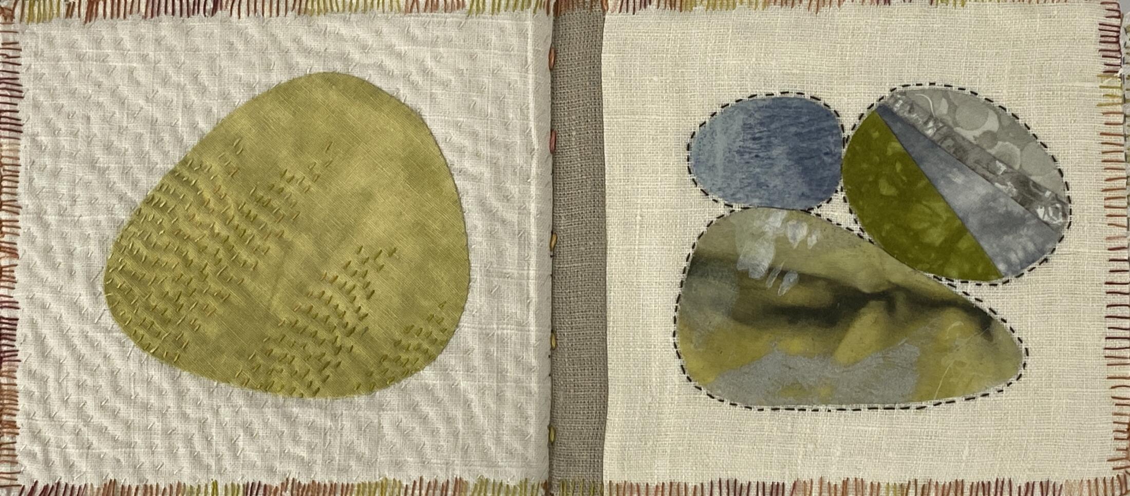 an image showing a two-page spread on my rock book. On the left, a chartreuse rock with stitching on the diagonal using running stitches and on the right, a composition with three rocks, a triangular one at the bottom, a pieced one on top and a smallish one on the left.