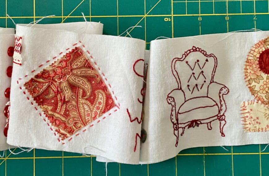 an image showing a piece of the come sit with me scroll where you can appreciate some of the fabrics used, the stitching and some buttons and details.
